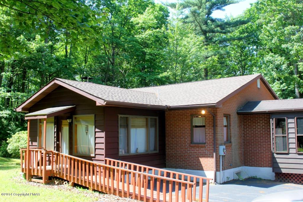 520 Gernerd Road Effort, PA 18330 - Photo 15 of 15 a view of a house that has a small deck and a garden