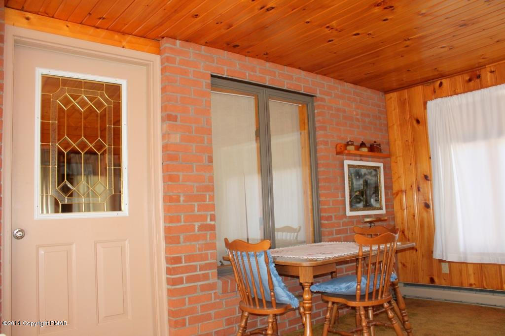 520 Gernerd Road Effort, PA 18330 - Photo 5 of 15 a patio with table and chairs