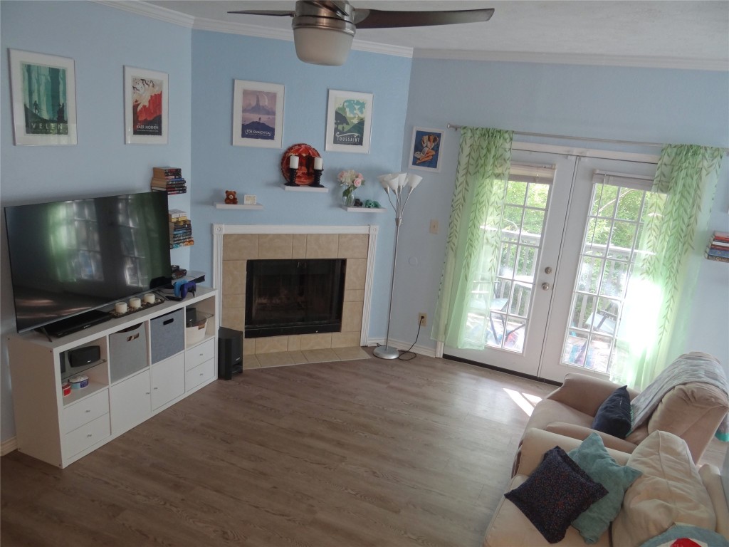 1005 North LBJ Drive, Unit B2 San Marcos, TX 78666 - Photo 1 of 13 a living room with furniture and a flat screen tv