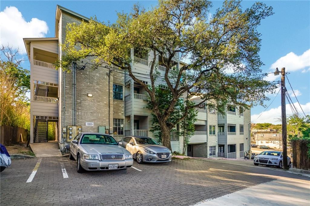 1005 North LBJ Drive, Unit B2 San Marcos, TX 78666 - Photo 13 of 13 a car parked on the side of a street