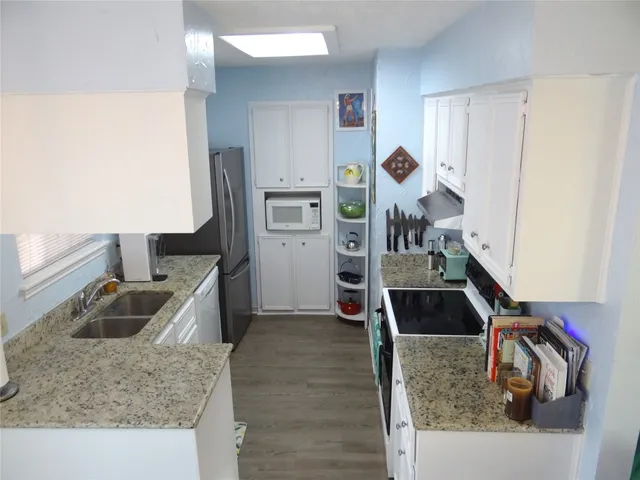 a view of a living room and front door