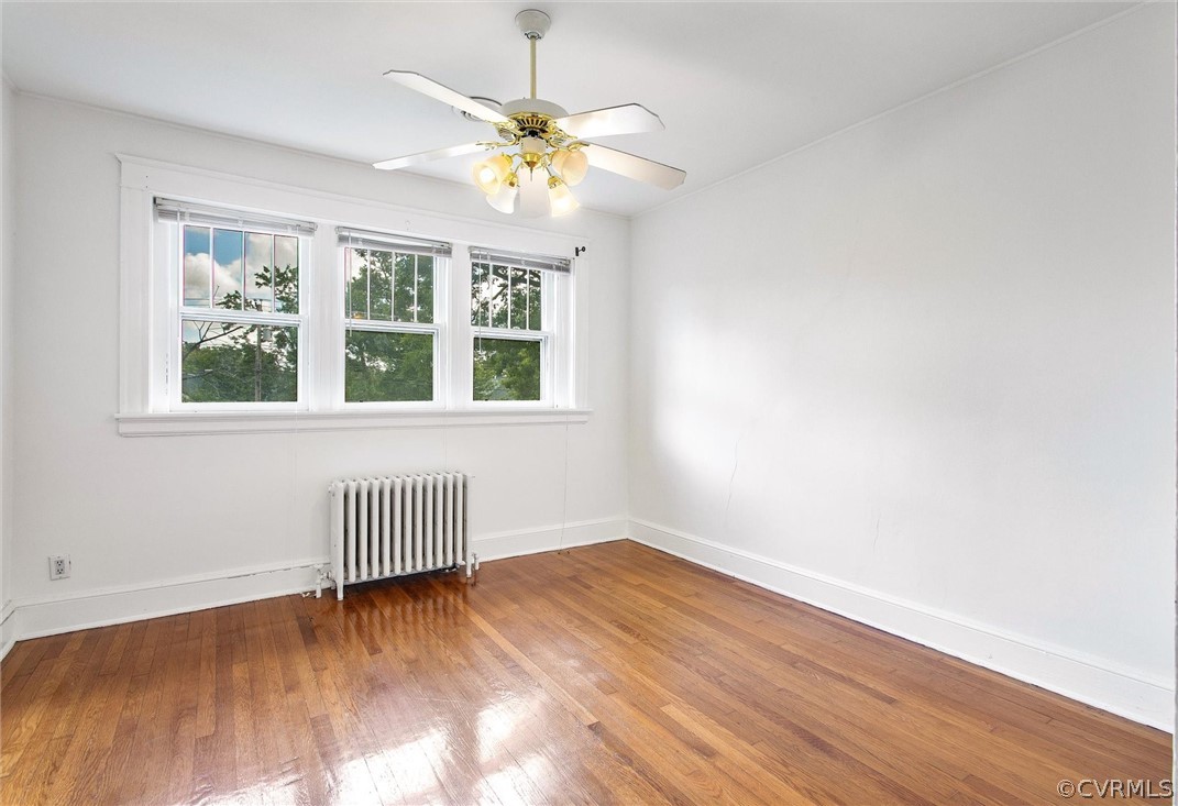 3417 West Hundred Road Chester, VA 23831 - Photo 14 of 23 an empty room with wooden floor and windows