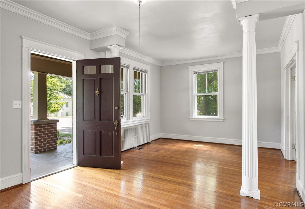 3417 West Hundred Road Chester, VA 23831 - Photo 2 of 23 an empty room with wooden floor and windows