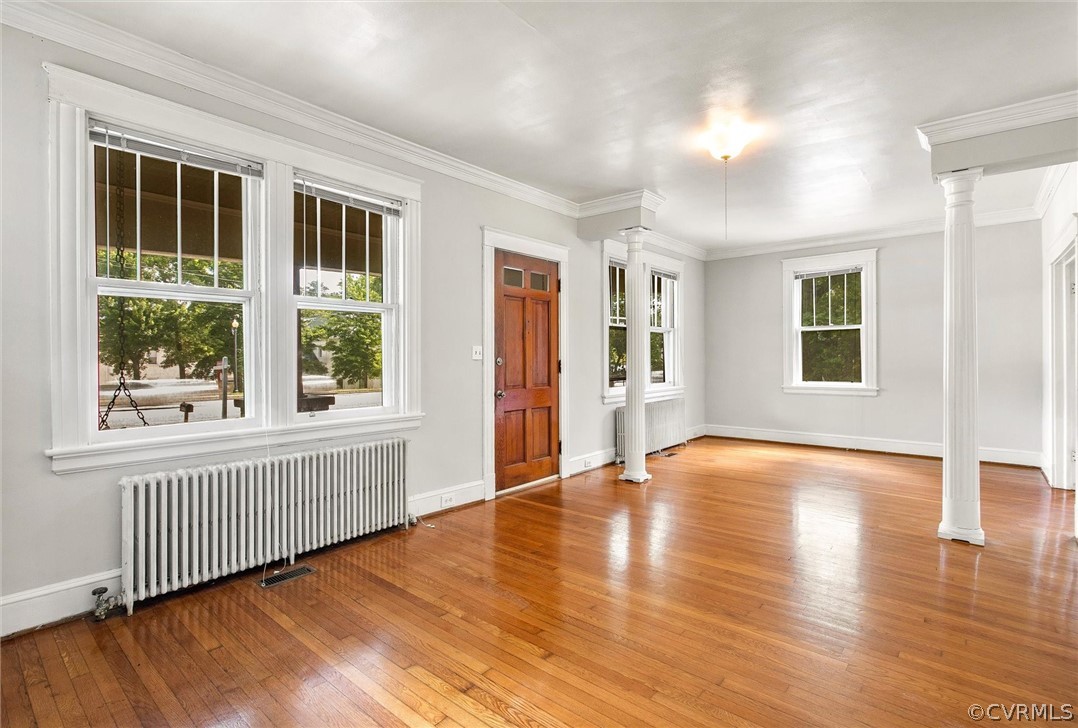 3417 West Hundred Road Chester, VA 23831 - Photo 4 of 23 a view of an empty room with wooden floor and a window