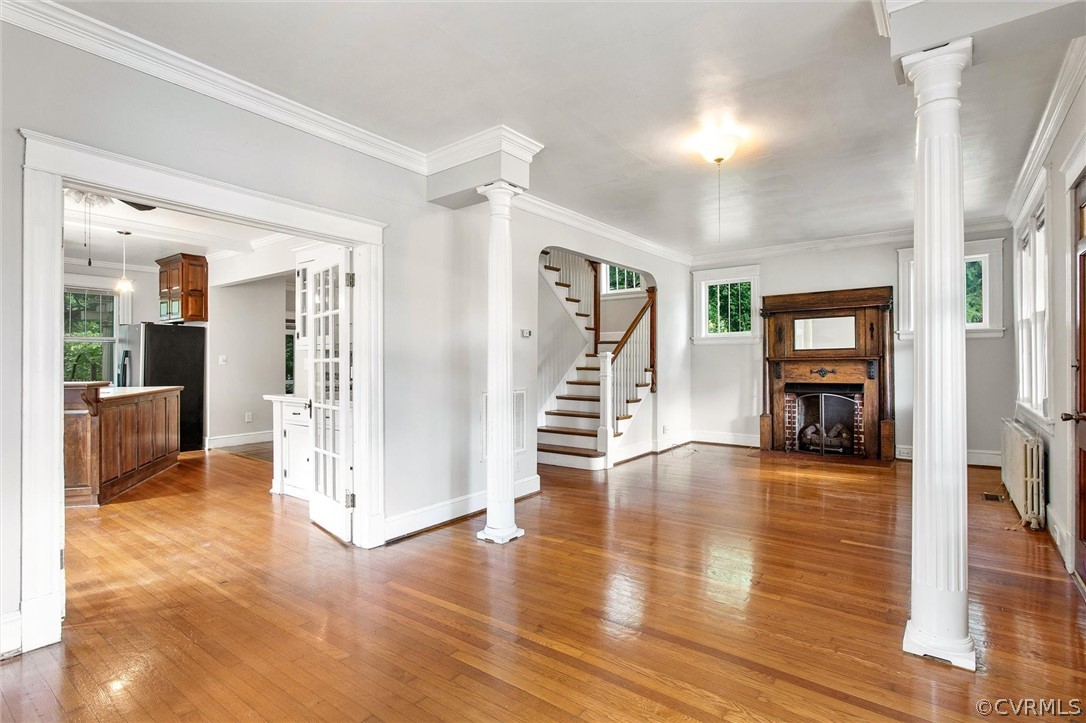 3417 West Hundred Road Chester, VA 23831 - Photo 6 of 23 a view of a hallway with wooden floor and a living room