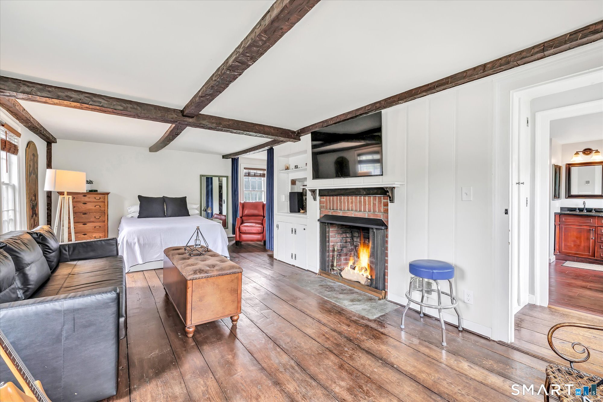 137 Rockwell Road Bethel, CT 06801 - Photo 22 of 40 SECOND FLOOR BEDROOM #3 ENSUITE WITH WOOD BURNING FIREPLACE AND SITTING AREA