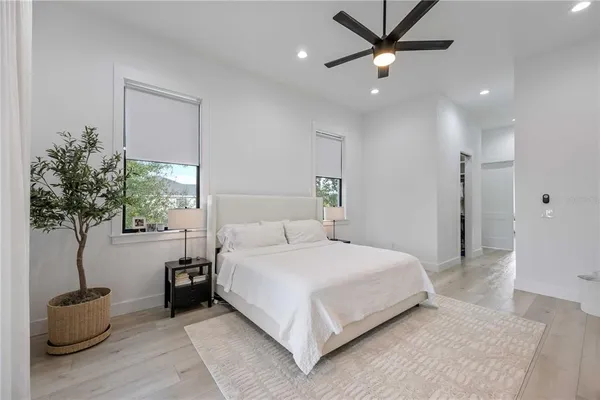 a bedroom with furniture and a bed