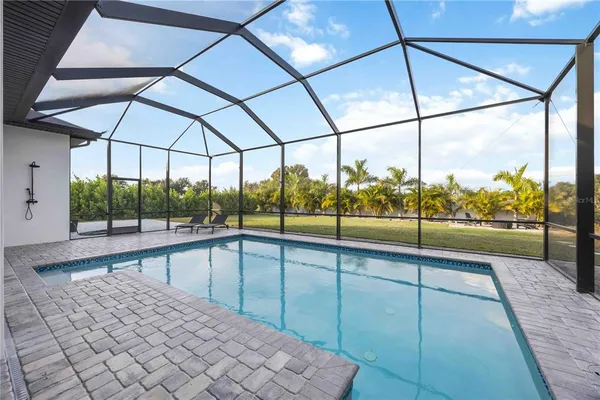 a view of a city with an ocean view