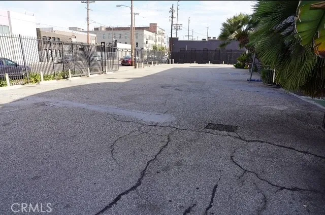 a view of a street with a building in the background