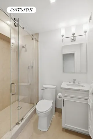 a bathroom with a granite countertop sink mirror and a