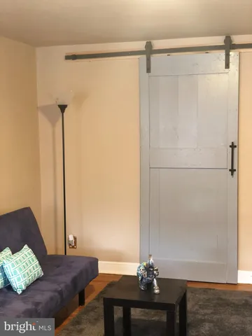 a bedroom with a bed and a table in it