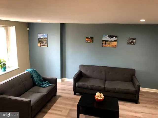 a living room with furniture and a couch