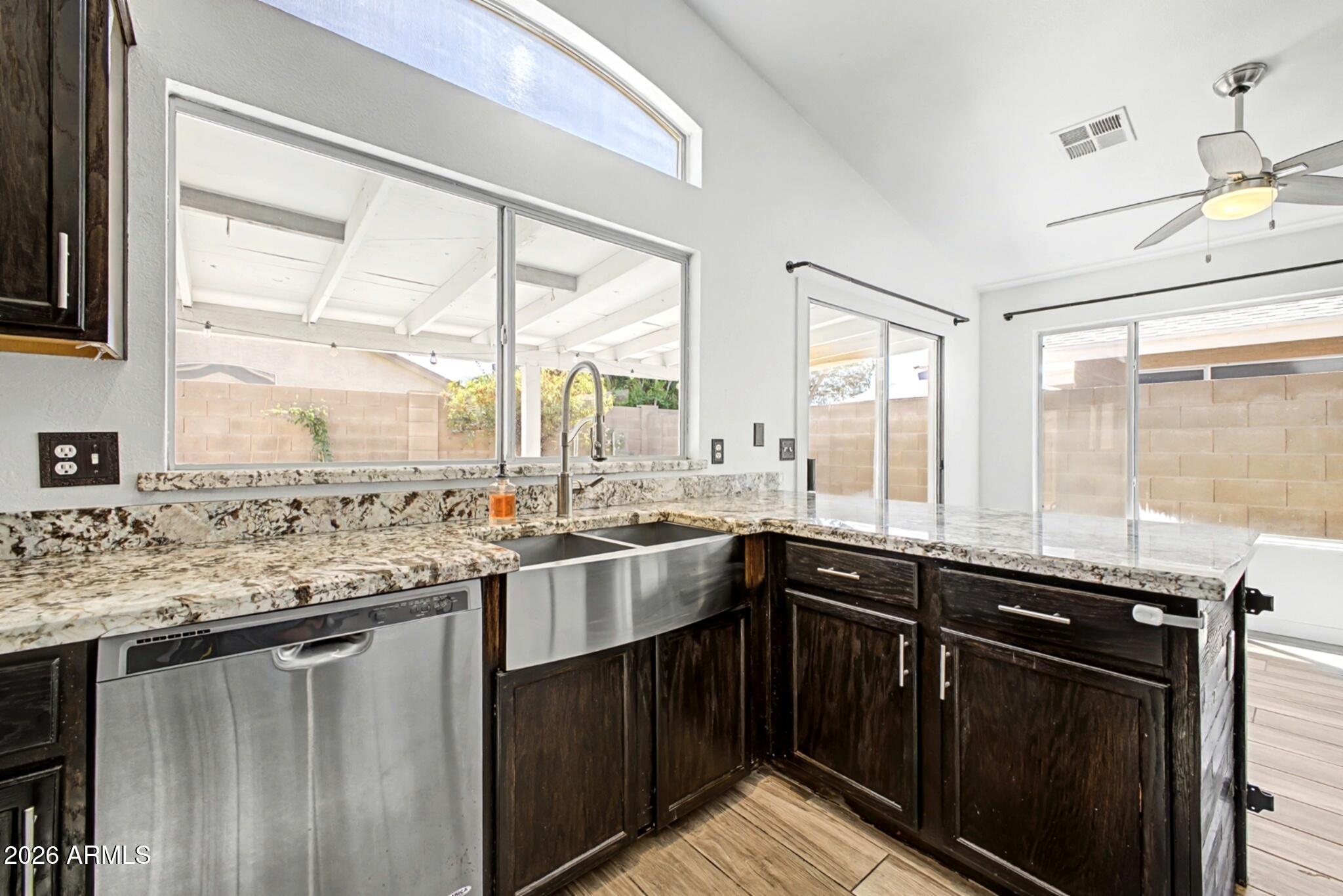 109 West Mohawk Lane Phoenix, AZ 85027 - Photo 5 of 23 a kitchen with a sink and a window