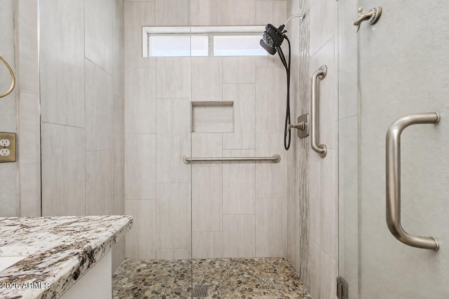109 West Mohawk Lane Phoenix, AZ 85027 - Photo 7 of 23 a bathroom with a granite countertop shower and a sink