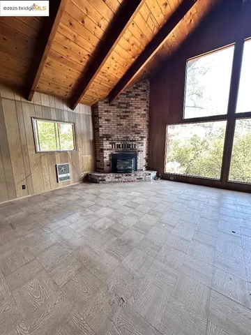 a view of a backyard of the house