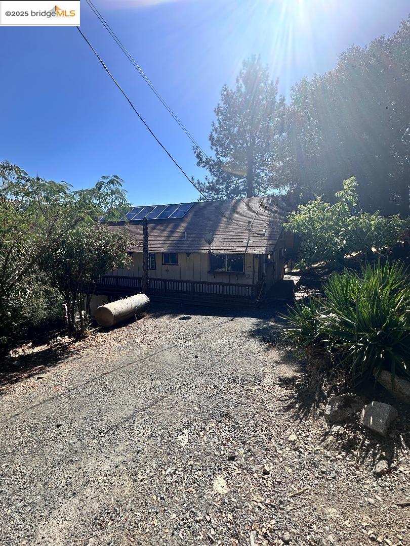 22071 Fallview Lane Sonora, CA 95370 - Photo 17 of 17 a view of a backyard of the house