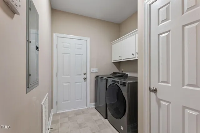 an aerial view of a house with a garden