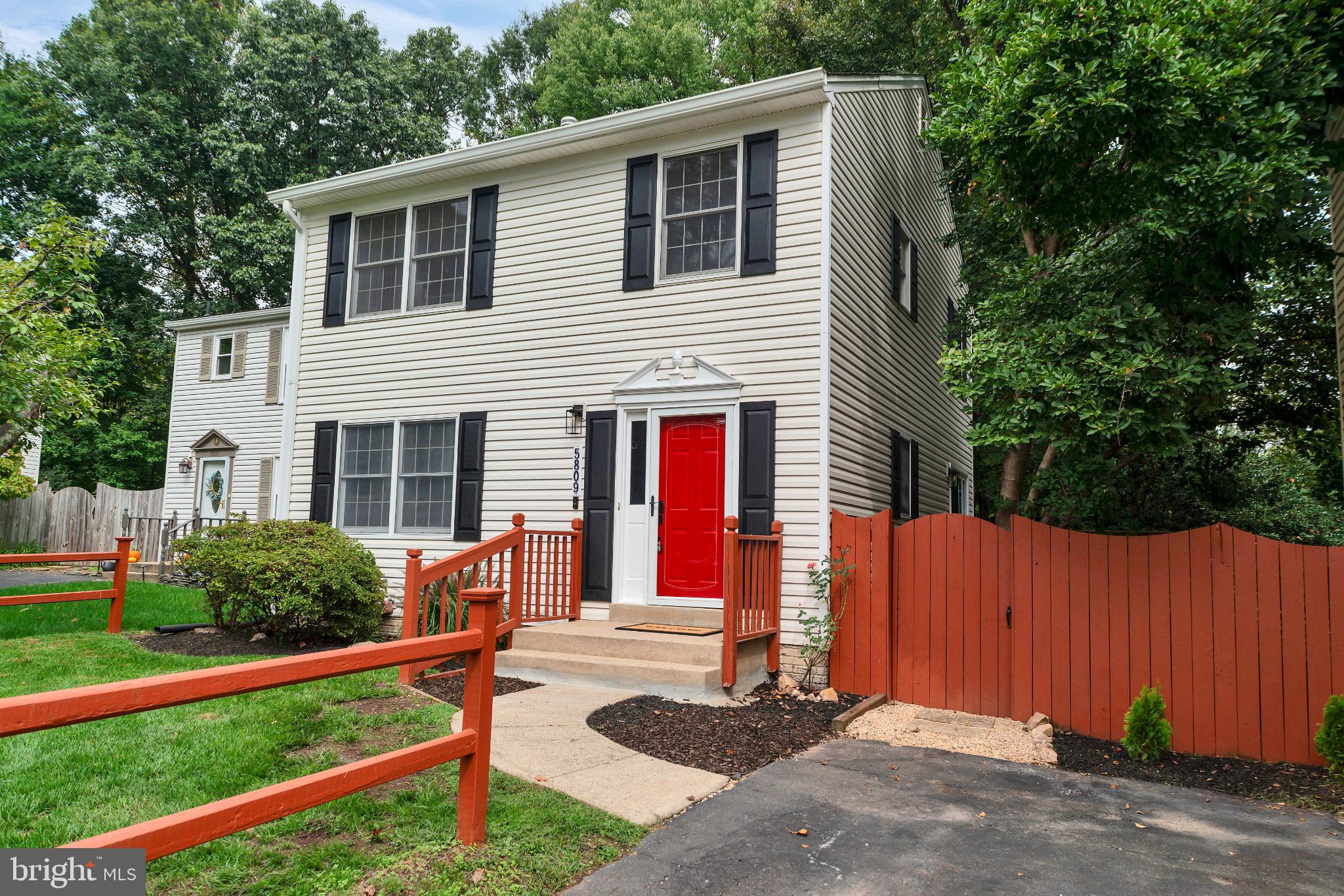 5809 Shana Place Burke, VA 22015 - Photo 2 of 46 a front view of house with yard