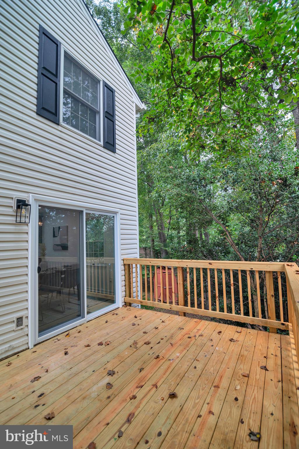 5809 Shana Place Burke, VA 22015 - Photo 23 of 46 a view of wooden deck