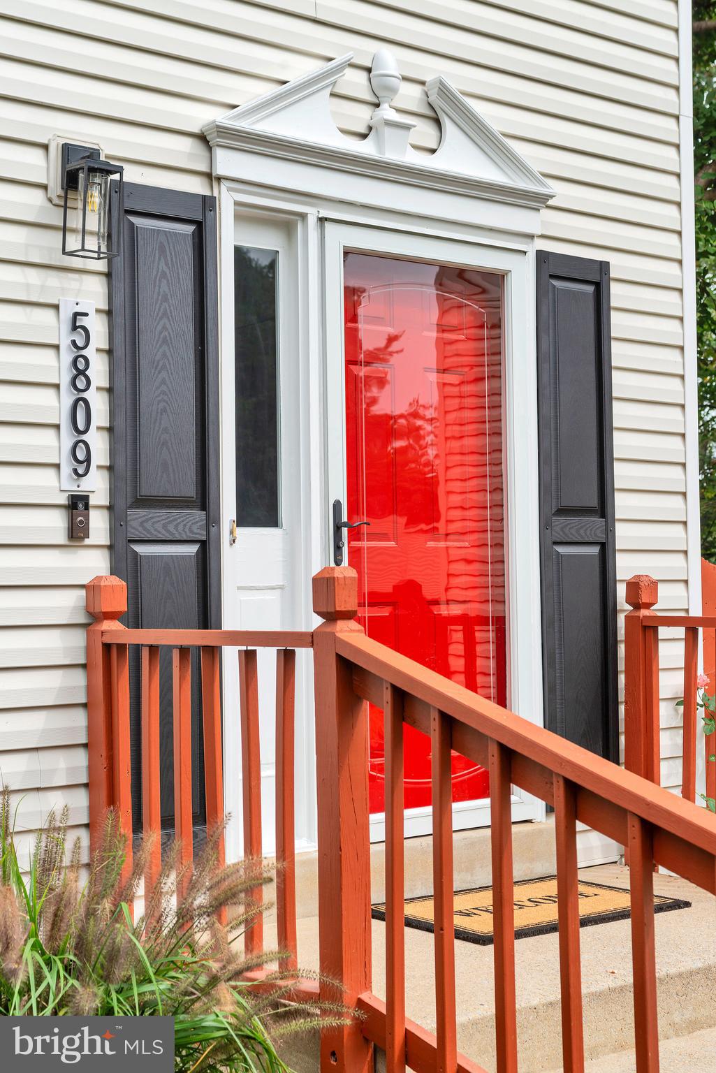 5809 Shana Place Burke, VA 22015 - Photo 4 of 46 a view of a porch with a small cabin