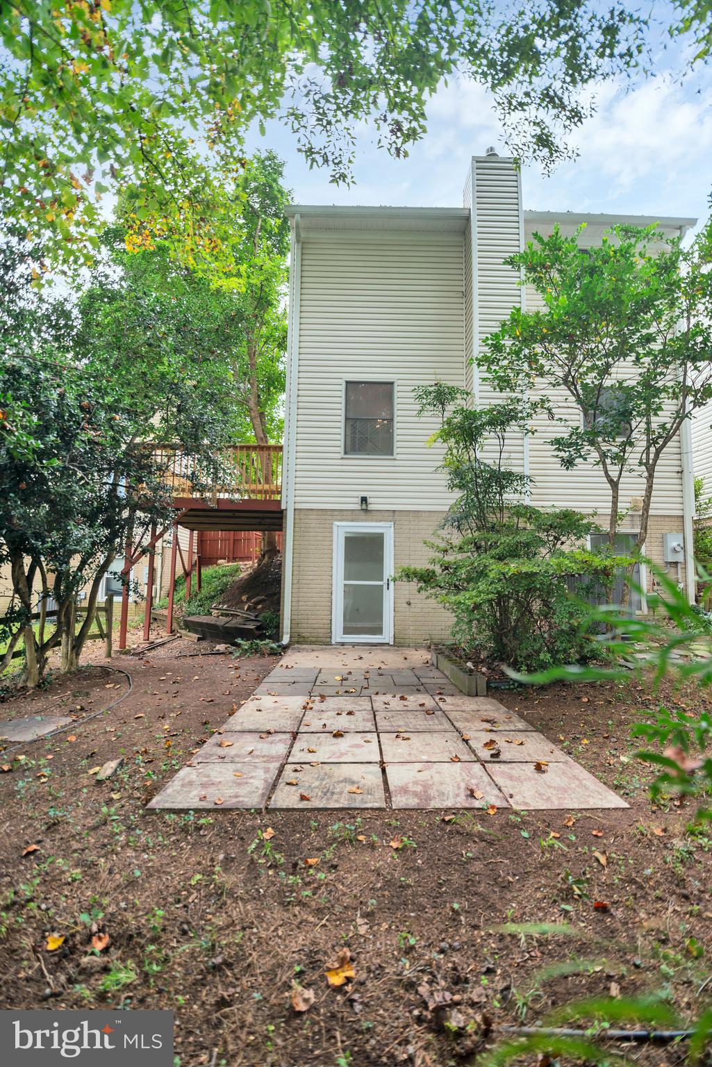 5809 Shana Place Burke, VA 22015 - Photo 45 of 46 a view of a house with a yard