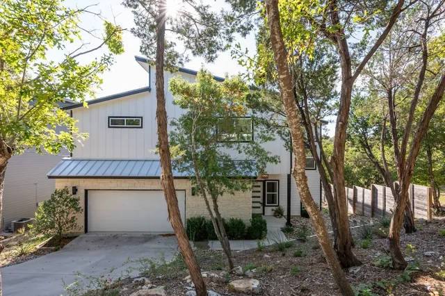 a backyard of a house with lots of green space