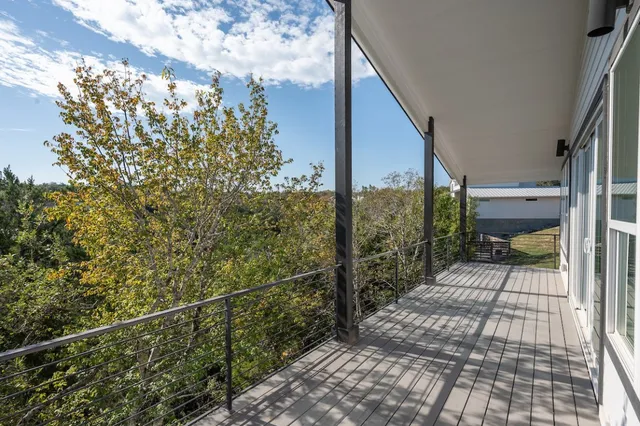 an aerial view of residential house and outdoor space