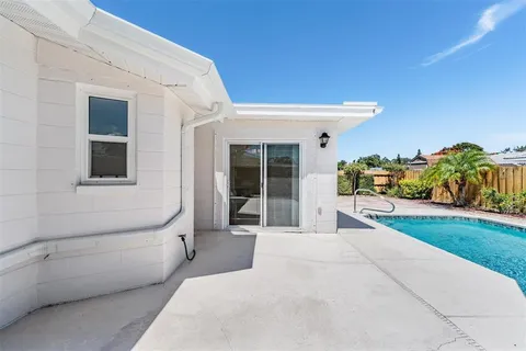 a house with garden in front of it