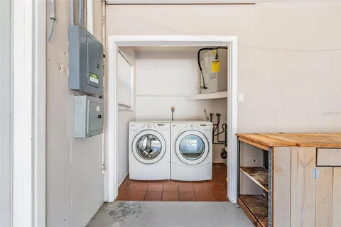 an aerial view of houses with outdoor space