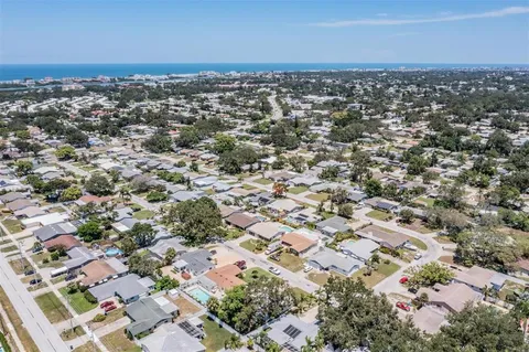 an aerial view of residential building and street