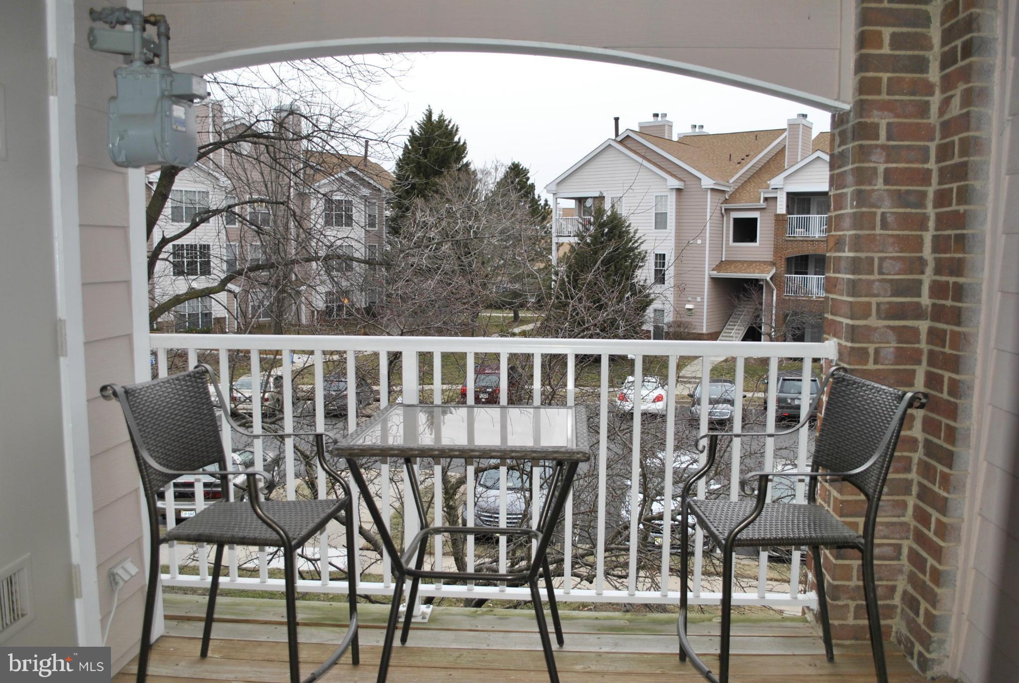 21012 Timber Ridge Terrace, Unit 202 Ashburn, VA 20147 - Photo 6 of 18 Exterior (Rear)