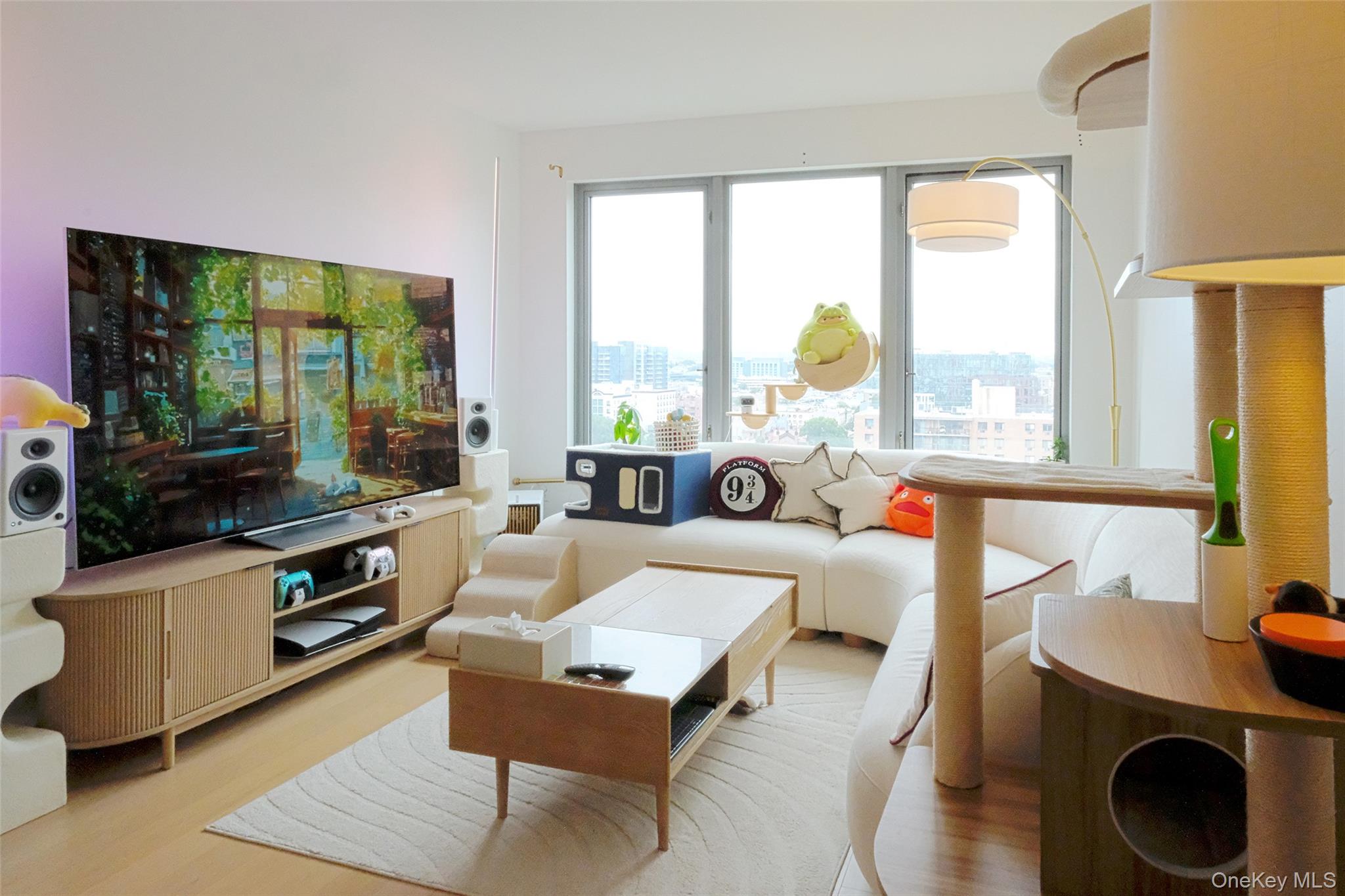 a living room with fireplace furniture and a flat screen tv