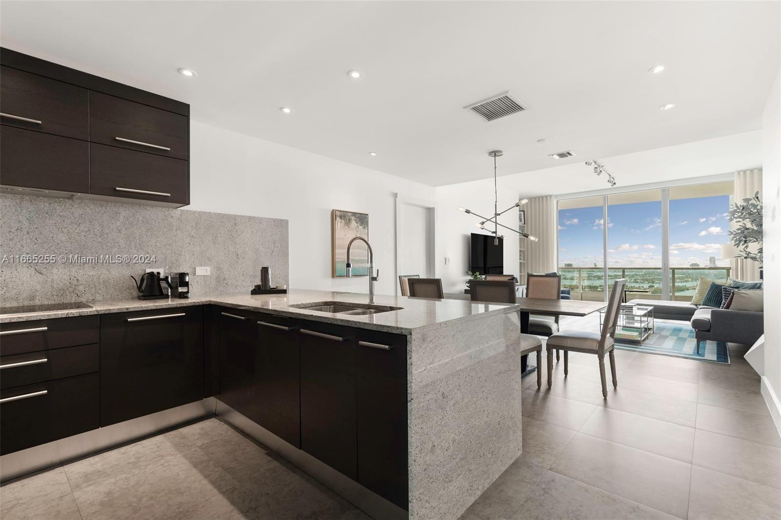 900 Biscayne Boulevard, Unit 3609 Miami, FL 33132 - Photo 5 of 36 a kitchen with lots of counter top space