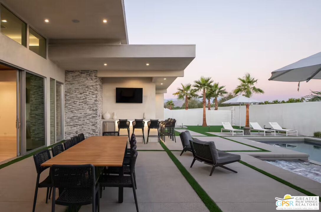 89022 Elemento Lane Indio, CA 92201 - Photo 23 of 31 a outdoor dining space with furniture and a potted plant