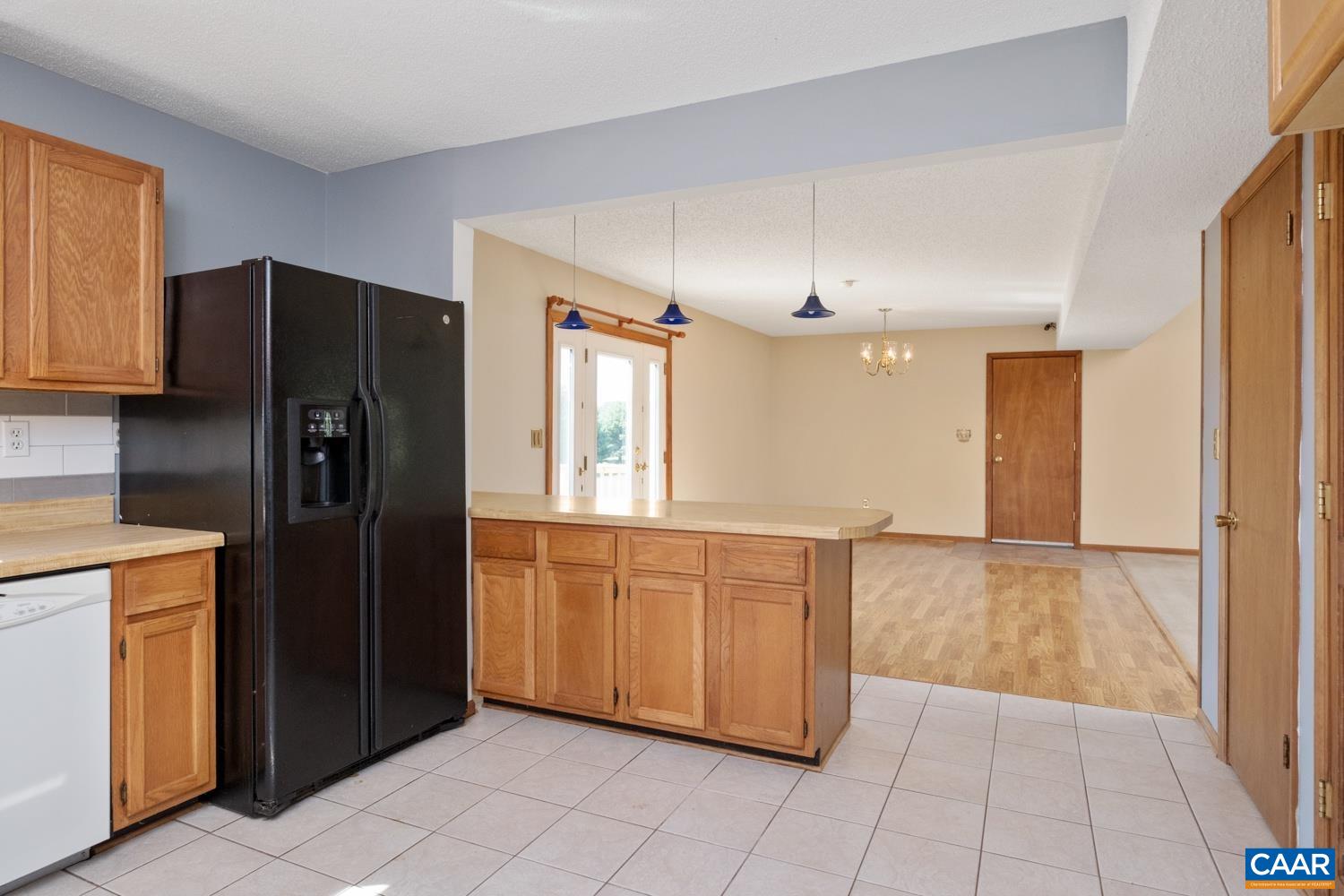634 Augusta Farms Road Waynesboro, VA 22980 - Photo 12 of 32 a kitchen with stainless steel appliances granite countertop a refrigerator and a sink