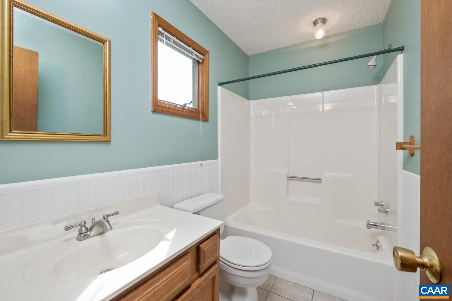 634 Augusta Farms Road Waynesboro, VA 22980 - Photo 17 of 32 a bathroom with a sink mirror toilet and bathtub