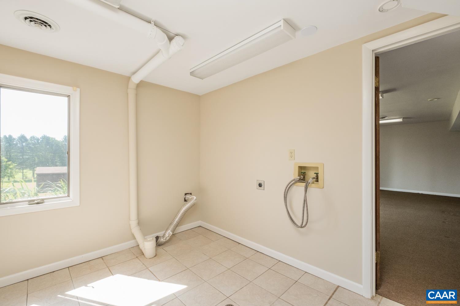 634 Augusta Farms Road Waynesboro, VA 22980 - Photo 26 of 32 a bathroom with a glass shower door