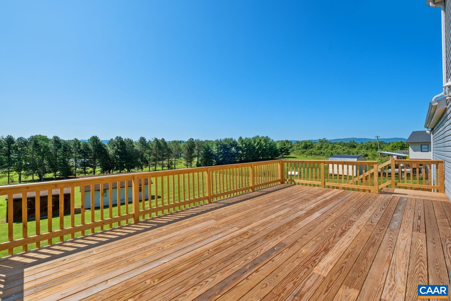 634 Augusta Farms Road Waynesboro, VA 22980 - Photo 28 of 32 a view of balcony with wooden floor and fence