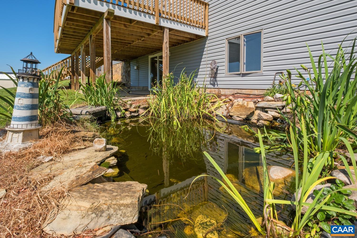 634 Augusta Farms Road Waynesboro, VA 22980 - Photo 30 of 32 a view of a house with a yard