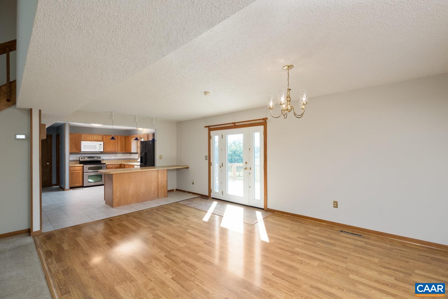 634 Augusta Farms Road Waynesboro, VA 22980 - Photo 9 of 32 a view of a living room kitchen and a window