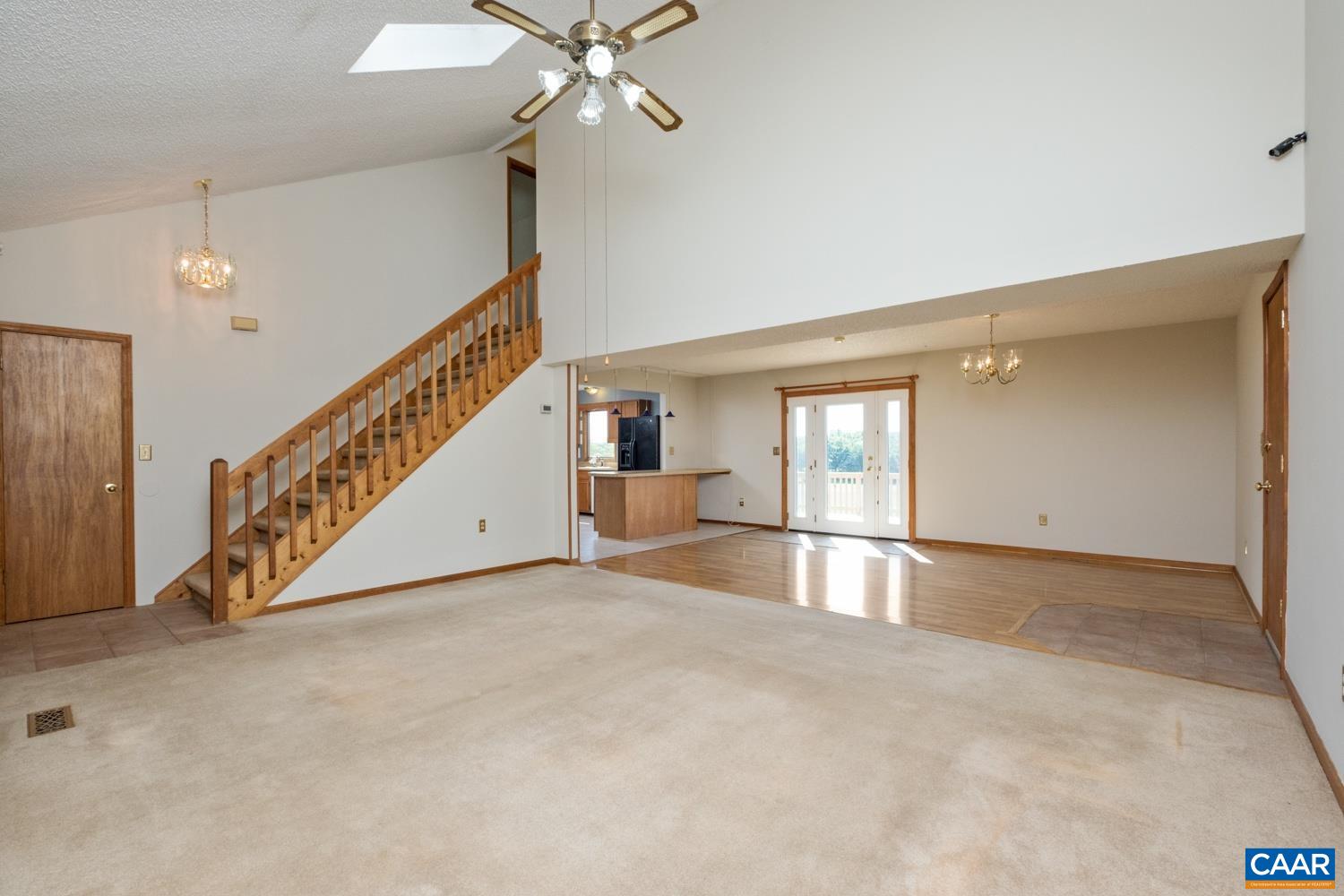 634 Augusta Farms Road Waynesboro, VA 22980 - Photo 10 of 32 a view of an empty room with chandelier fan