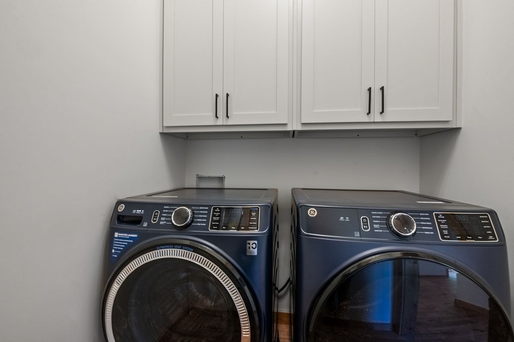 168 Ewing Street Blue Ridge, GA 30513 - Photo 23 of 46 a utility room with dryer and washer