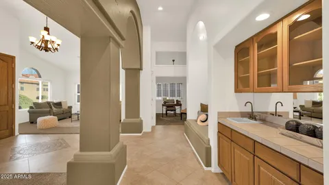 a dining room with furniture window and wooden floor