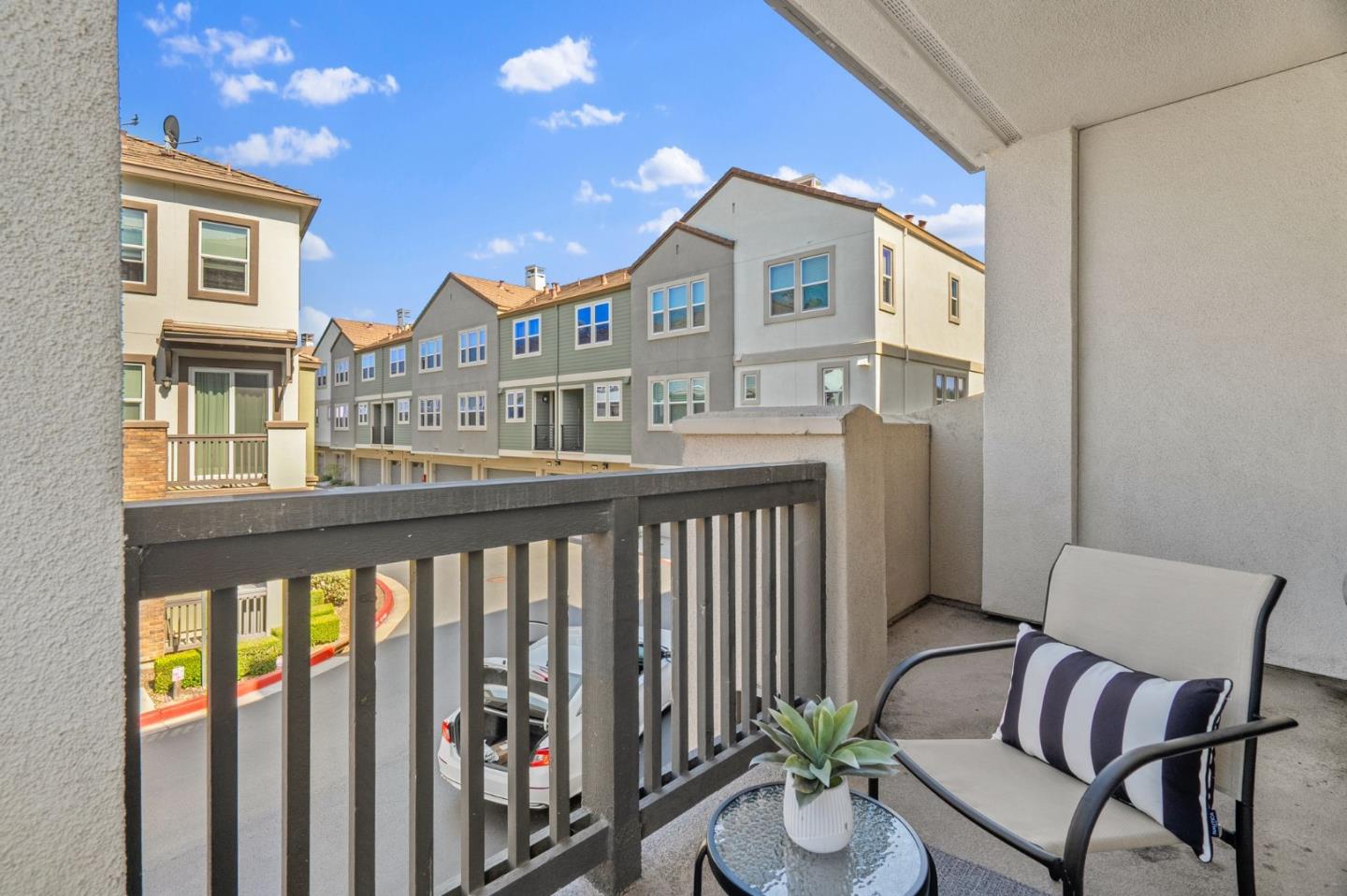 1453 Cherry Circle Milpitas, CA 95035 - Photo 13 of 53 a view of a chair and table in the balcony