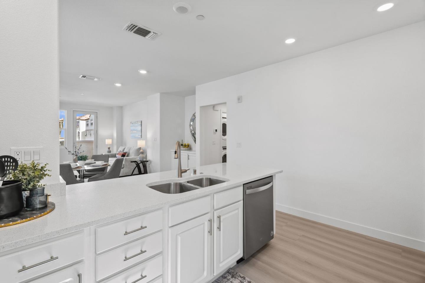 1453 Cherry Circle Milpitas, CA 95035 - Photo 19 of 53 a bathroom with a double vanity sink and mirror