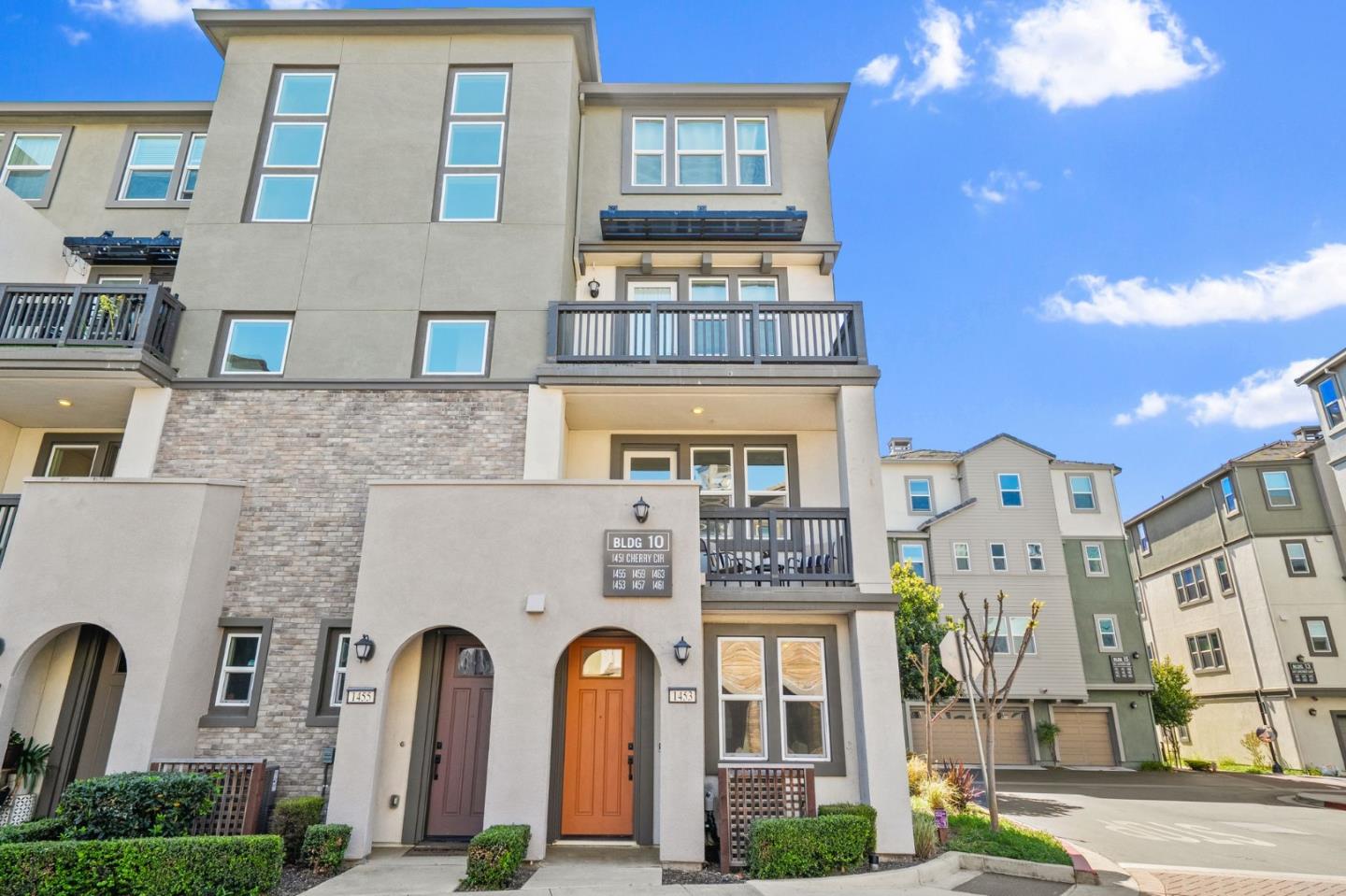 1453 Cherry Circle Milpitas, CA 95035 - Photo 2 of 53 a front view of a multi story residential apartment building