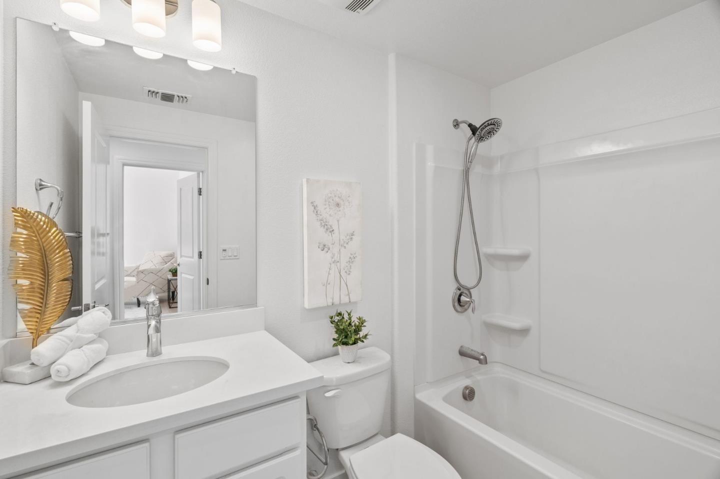 1453 Cherry Circle Milpitas, CA 95035 - Photo 23 of 53 a bathroom with a sink vanity tub and shower