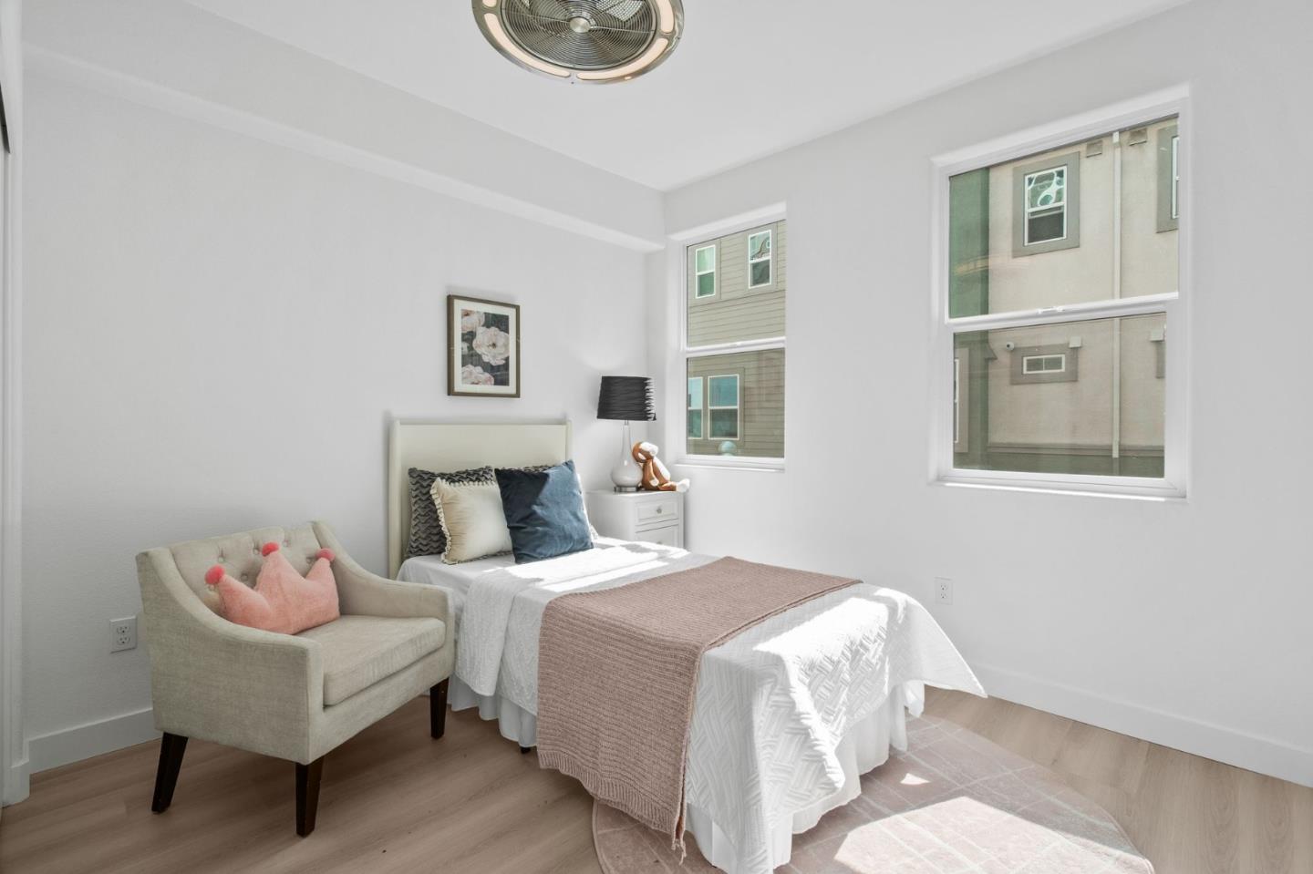 1453 Cherry Circle Milpitas, CA 95035 - Photo 27 of 53 a bedroom with a bed and a window