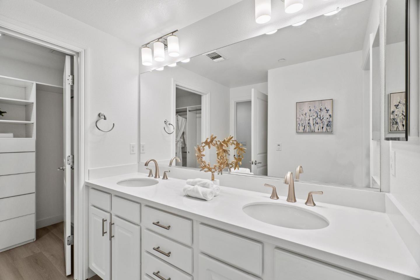 1453 Cherry Circle Milpitas, CA 95035 - Photo 30 of 53 a bathroom with double vanity sinks and a mirror