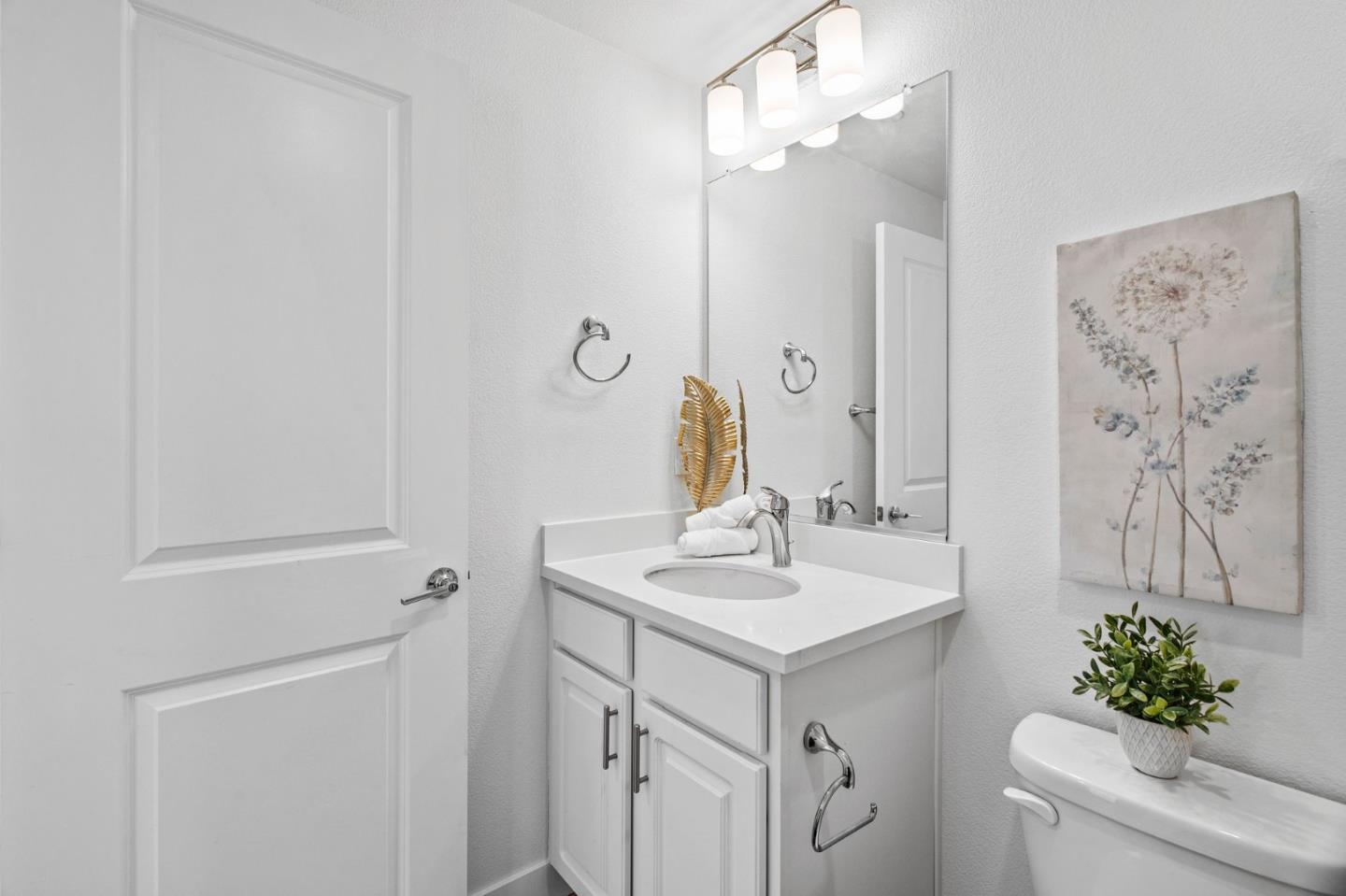 1453 Cherry Circle Milpitas, CA 95035 - Photo 37 of 53 a bathroom with a sink vanity and a mirror